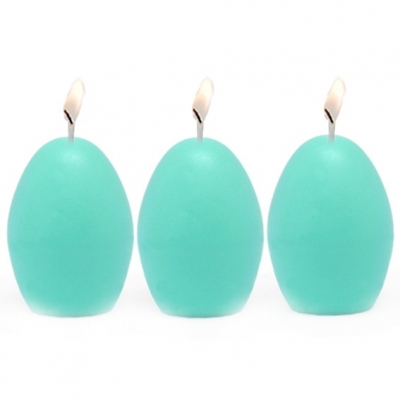 Blue egg-shaped candles made with the mold for candles 3 eggs.